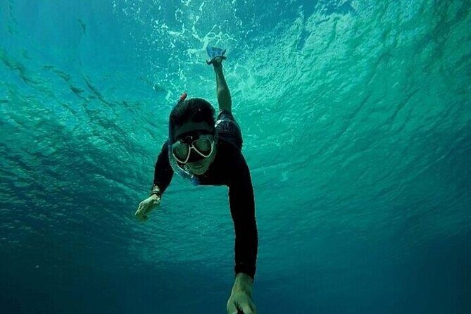 (ALL- IN) Bali Snorkeling Blue Lagoon with Waterfall Visit - Blue Lagoon Beach: coarse white sand and bigger underwater surprises