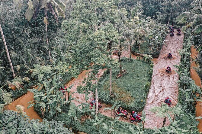 Bali ATV Quad Bike Adventure with Gorilla Cave Pass By Waterfall - Infinity pool after the mud: the best kind of reward
