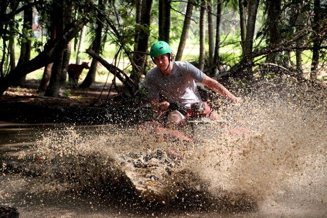 Bali ATV Ride Ubud Waterfall, Ricefield,River,Barong Cave, Lunch - Waterfall scenery and cave time: where you’ll get wet or muddy