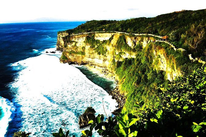 Bali Halfday Tour Uluwatu - Padang Padang Beach: sunbathing with cliffside drama