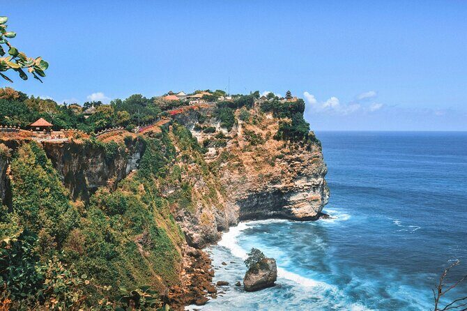 Explore Bali Beaches with Private Minivan Tour - Uluwatu Temple: cliffside sanctuary, carvings, and monkey-smart behavior