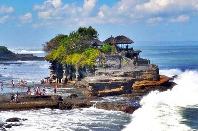 Half Day Tour: Tanah Lot Sunset & Taman Ayun Temple Included Entrance Ticket - Getting there from Kuta: pickup, AC comfort, and an English-speaking driver